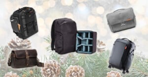 A holiday-themed background with five different camera bags displayed: two backpacks, two messenger bags, and one rolling bag, all arranged among pinecones and branches with a bokeh light effect.