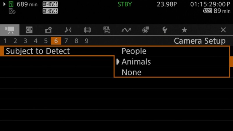 Camera menu screen showing "Subject to Detect" options under "Camera Setup": People, Animals, and None. Tab 6 is selected. The screen displays shooting information at the top, including standby, time, and battery.