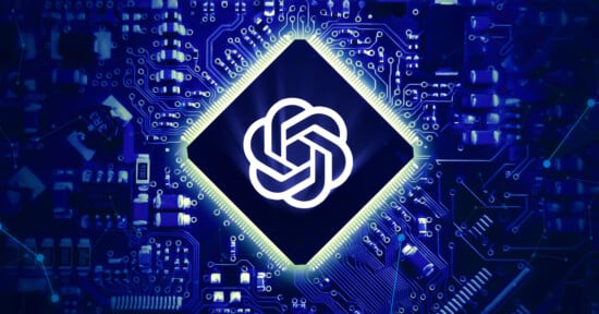 A glowing OpenAI logo is centered on a diamond-shaped microchip, surrounded by illuminated blue circuitry patterns, representing artificial intelligence and technology integration.