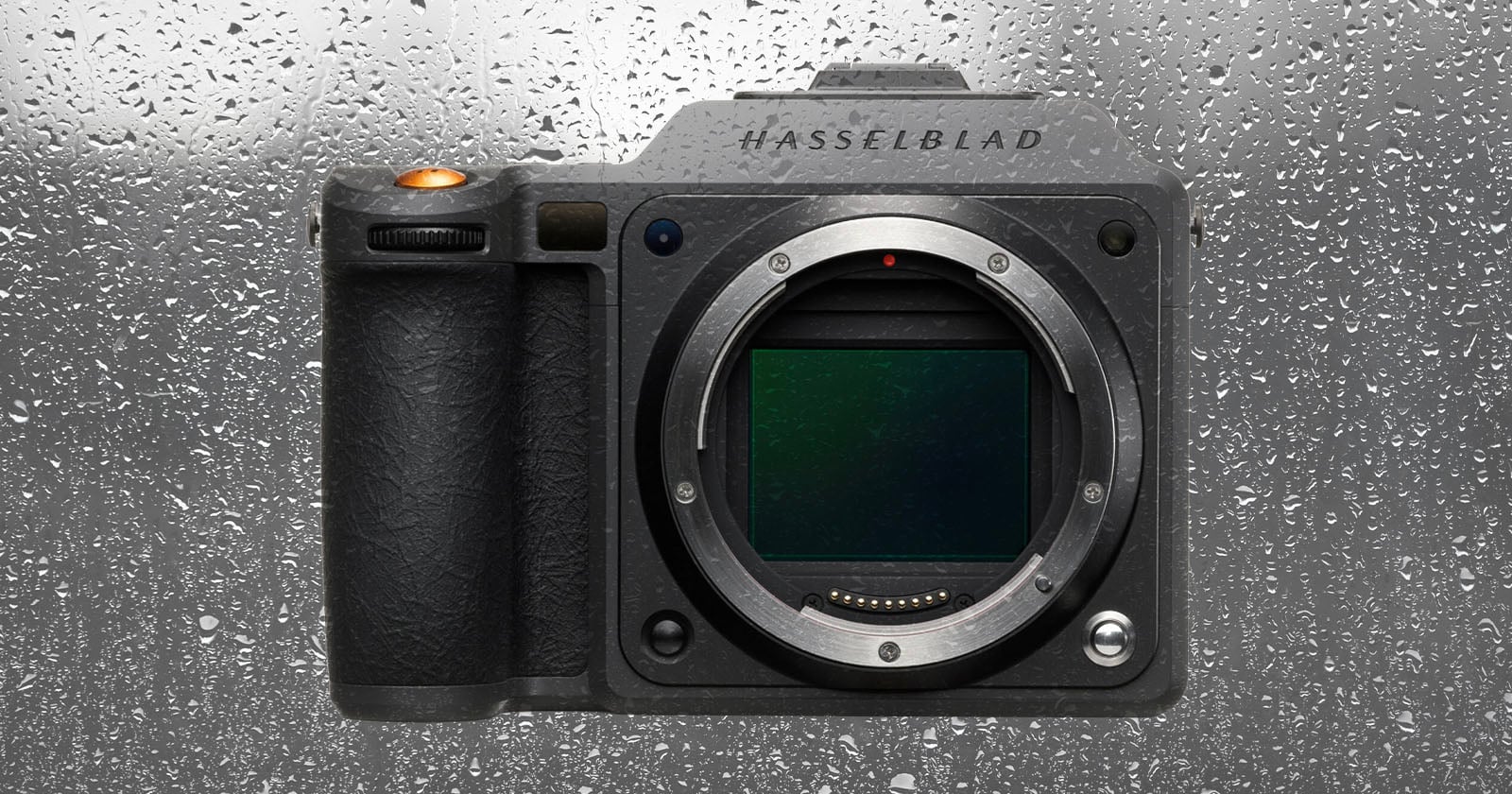 A Hasselblad camera body without a lens is shown against a wet, rain-covered glass background. Water droplets cover the surface behind the camera.