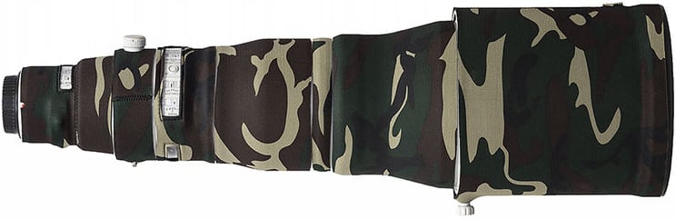 A large camera telephoto lens covered in a camouflage-patterned protective sleeve, shown horizontally against a white background.