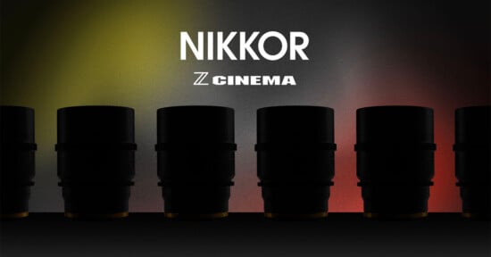Silhouetted camera lenses are lined up in front of a dark gradient background with “NIKKOR Z CINEMA” in bold white text above them. The background fades from yellow on the left to red on the right.