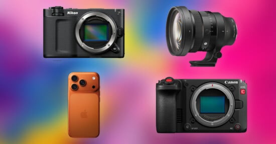 Four devices against a colorful gradient background: a Nikon mirrorless camera (top left), a large camera lens (top right), an orange iPhone (bottom left), and a Canon mirrorless camera (bottom right).