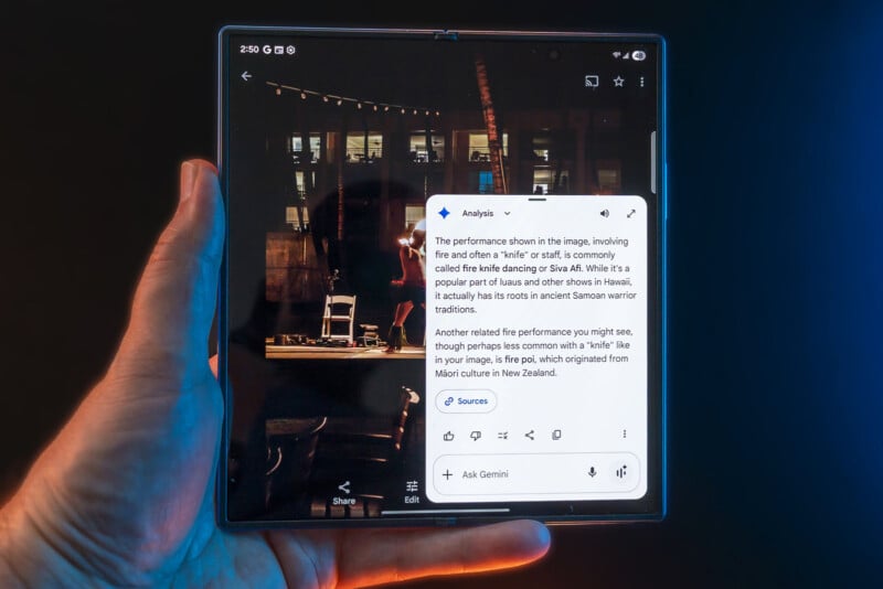 A hand holds an open foldable smartphone displaying a photo on the left and an AI-generated text analysis about knife fire dancing on the right side of the screen.