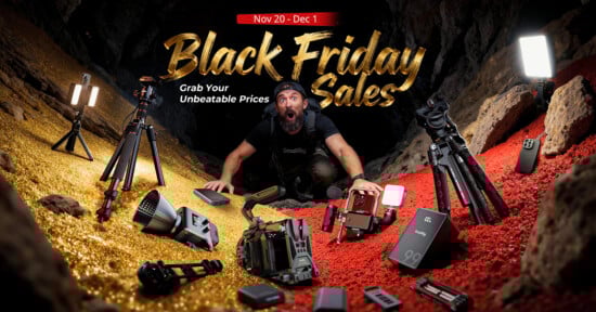 A man kneels in a cave surrounded by cameras, tripods, lights, and tech gear. Gold and red glitter cover the ground. Text reads, "Black Friday Sales, Nov 20 - Dec 1. Grab Your Unbeatable Prices.