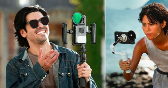 A man and a woman each hold camera stabilizers with smartphones attached. The man, wearing sunglasses and smiling, stands outdoors; the woman, focused, uses her stabilizer near water.