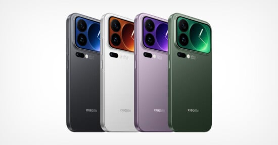 Four Xiaomi smartphones are displayed side by side in black, white, purple, and green colors. Each phone shows its back, featuring dual rear cameras and a large square module with a digital clock design.